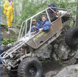 Picture of me and a friend offroading in Harlan Ky in a buggy I built.
